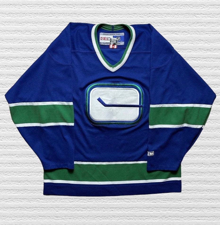 Vancouver Canucks CCM Stick in Rink Jersey Size (L)